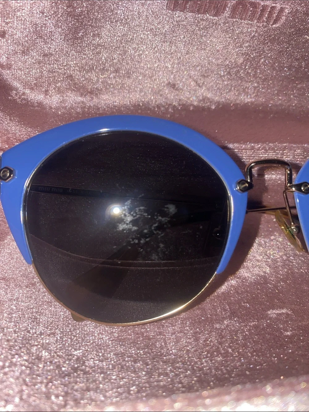 Authentic Miu Miu women’s Blue Round Metal-Trim Sunglasses